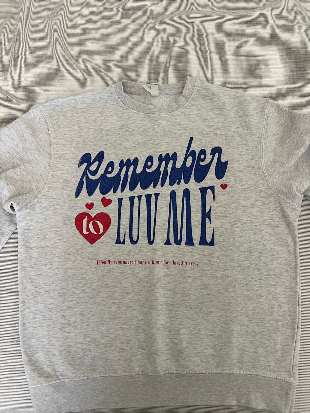 Shop Kristin Jones - “Remember to Luv Me Graphic Sweatshirt”